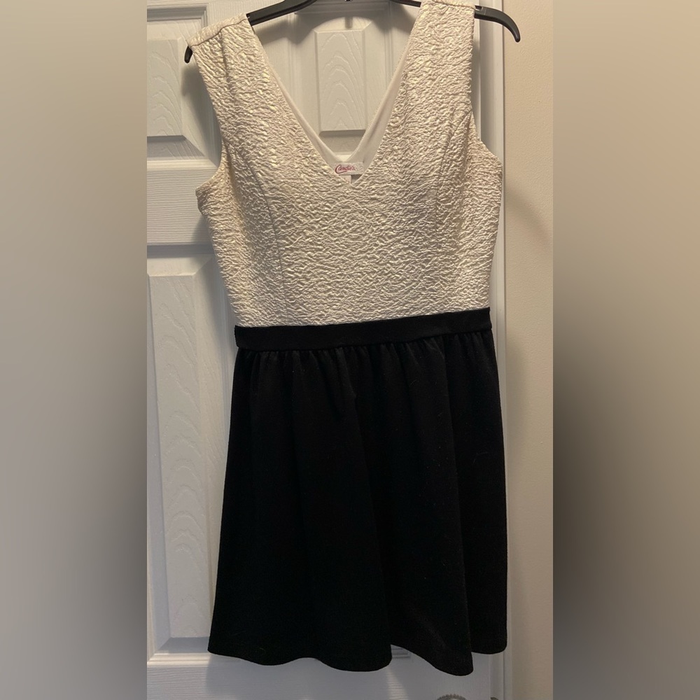 Candies polyester dress. Half black half white/gold shimmer. Size Large